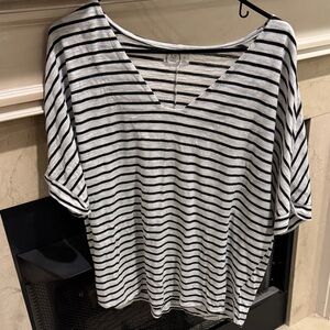 Black/White Striped Women's knit Top listing 9780. Worn several times. Size XL